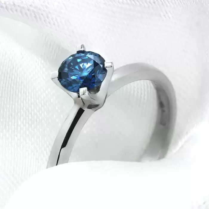 Δαχτυλίδι Μονόπετρο Λευκόχρυσος Κ18 με Μπλε Διαμάντι